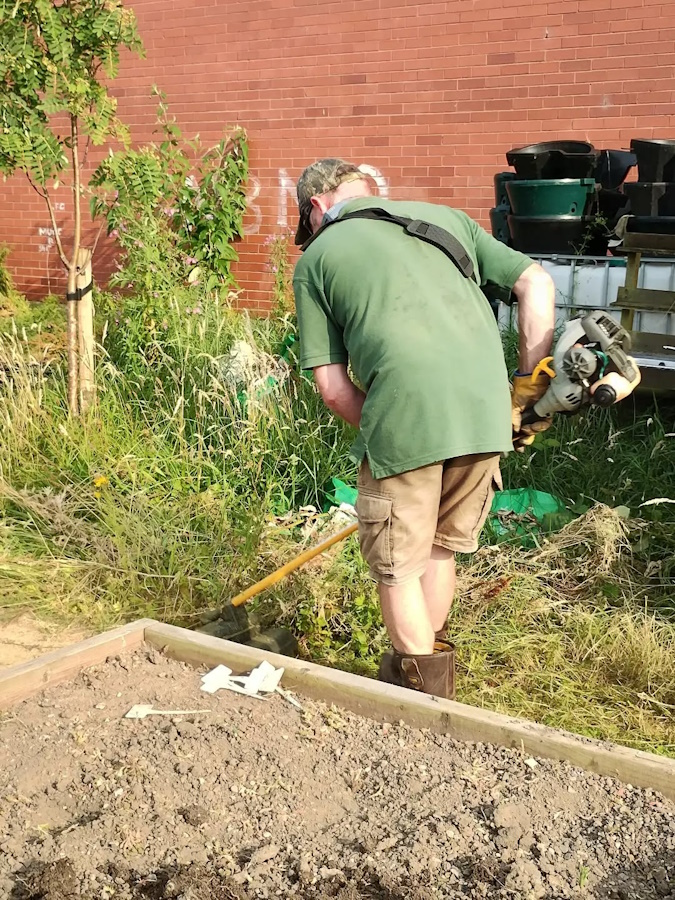 click to see more images Lots of tidying in the Community Garden.