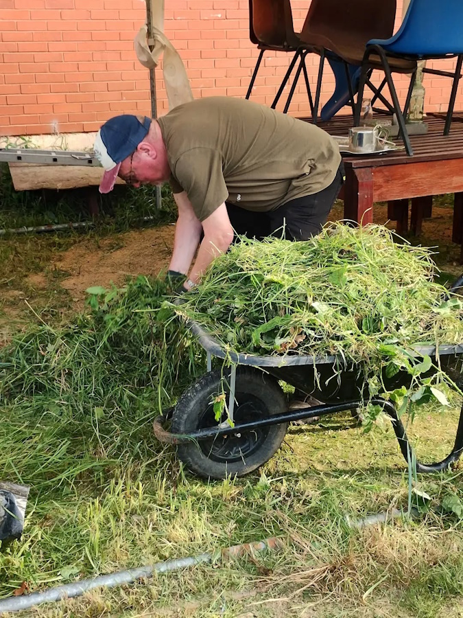 click to see larger image Lots of tidying in the Community Garden.
