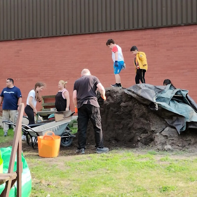 many hands make light work in the community garden