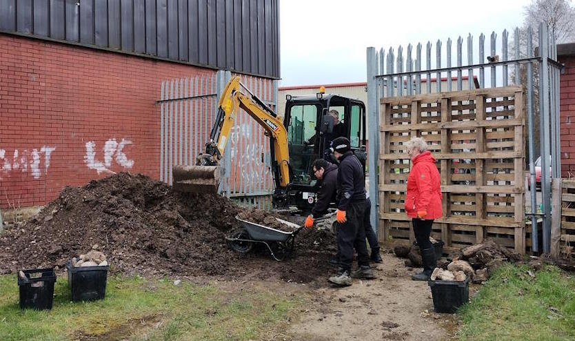 mini digger brought in