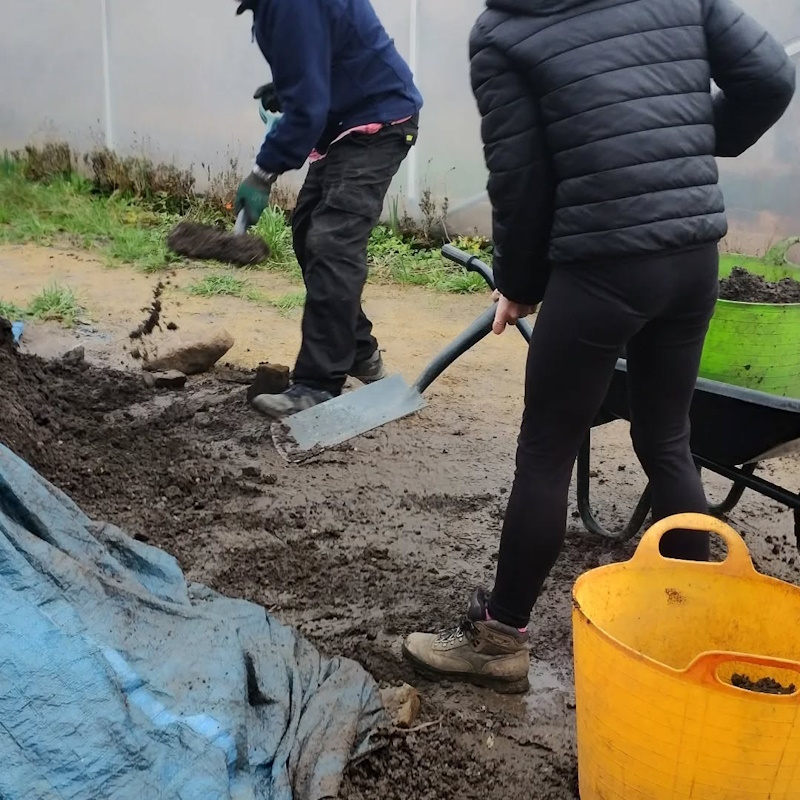 click to see larger image weeding up and topping up raised beds